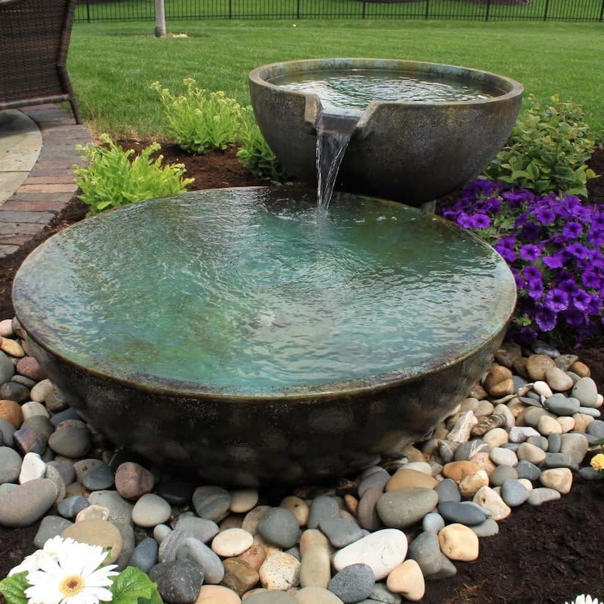 Garden stone water fountain with flowers around - Spillway Bowl and Basin Fountain Kit – Patina – 32″/40″ Dia (81/102 cm)