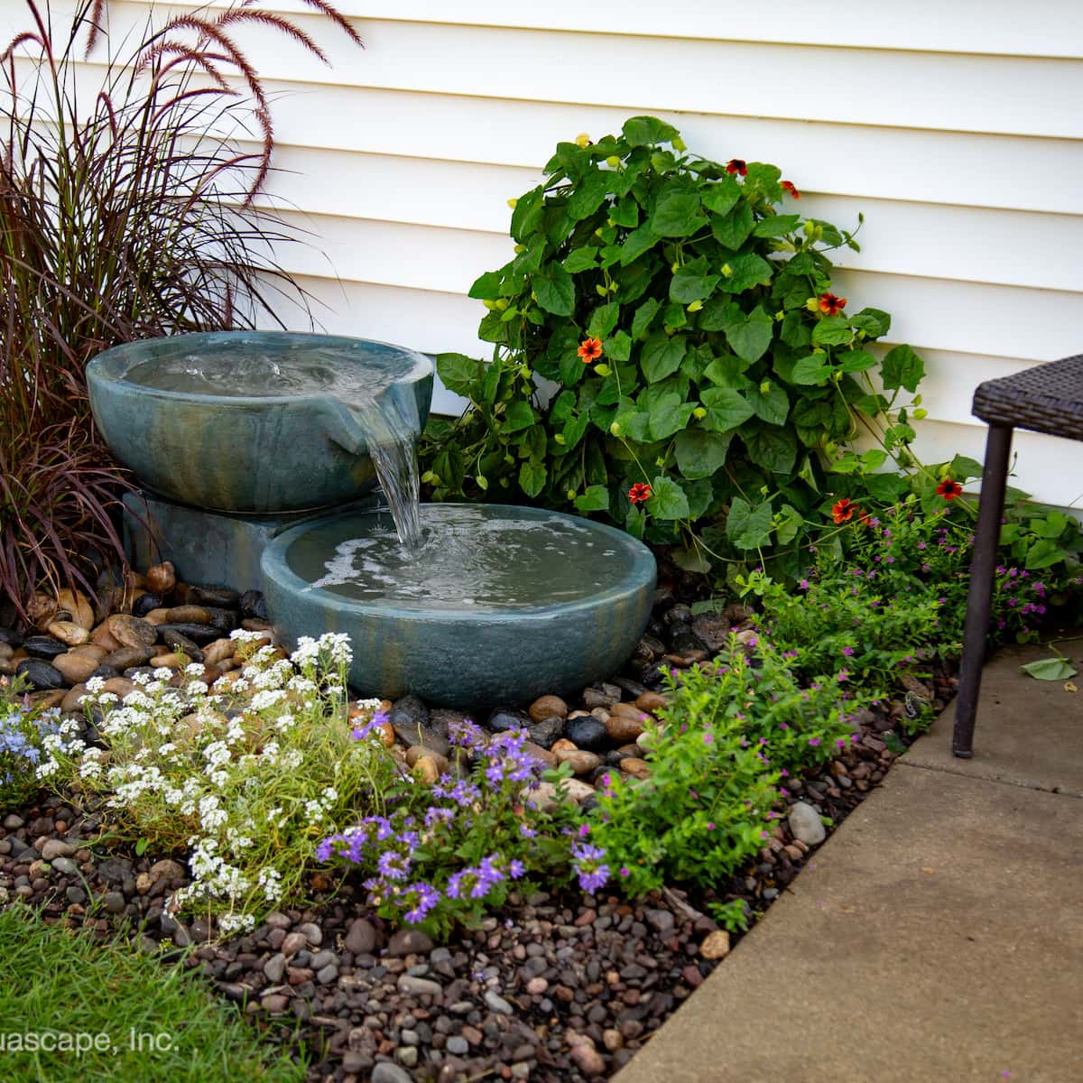 Garden water fountain with colorful flowers and plants. - Spillway Bowl and Basin Fountain Kit – Iron Ore – 19″/21″ Dia (49/52 cm)