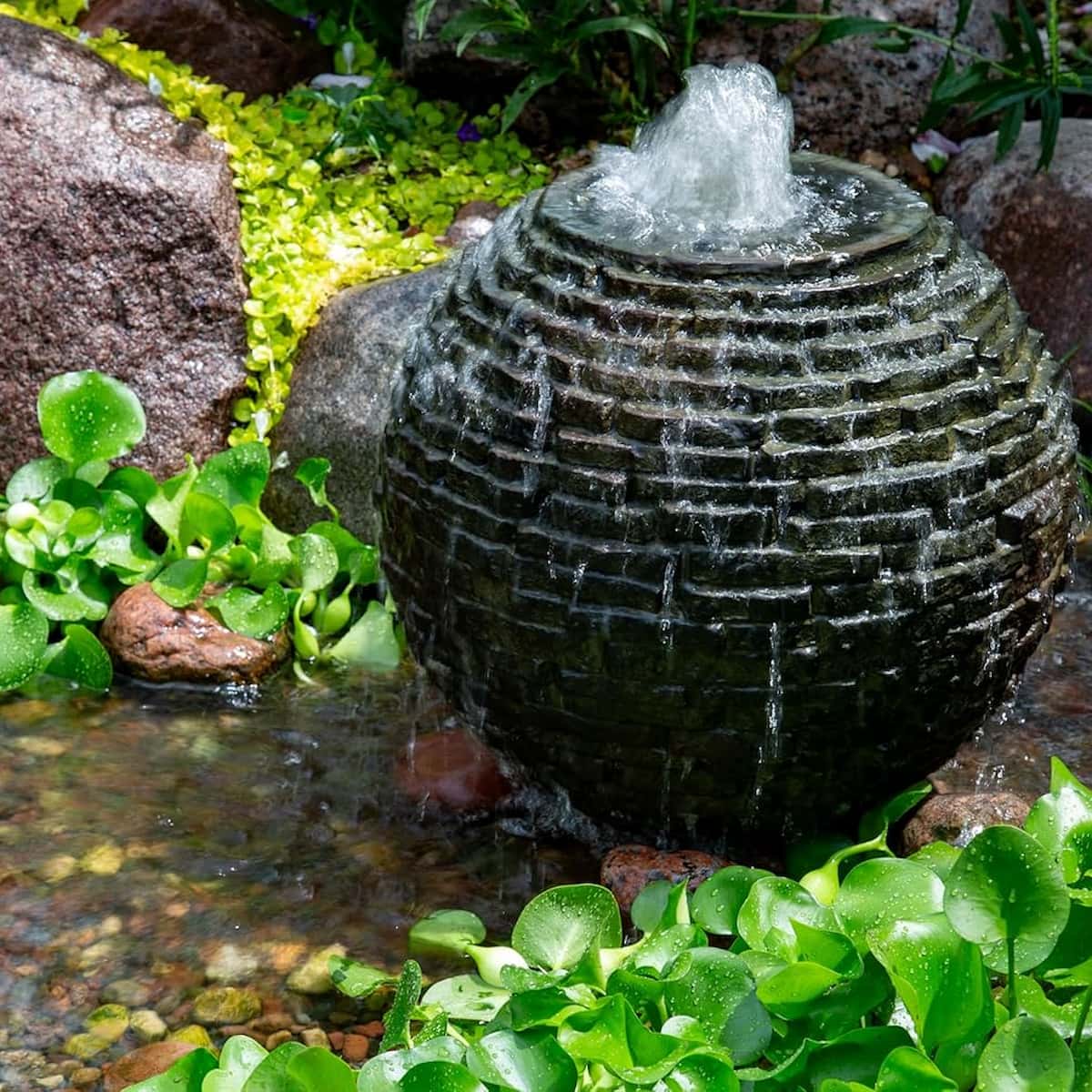 Garden fountain with lush greenery - Stacked Slate Sphere Fountain Kit – 18″ Dia (46 cm)